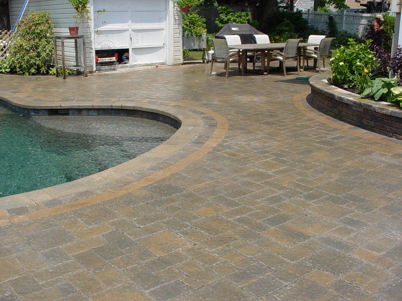 backyard pool patio with techo bloc pavers